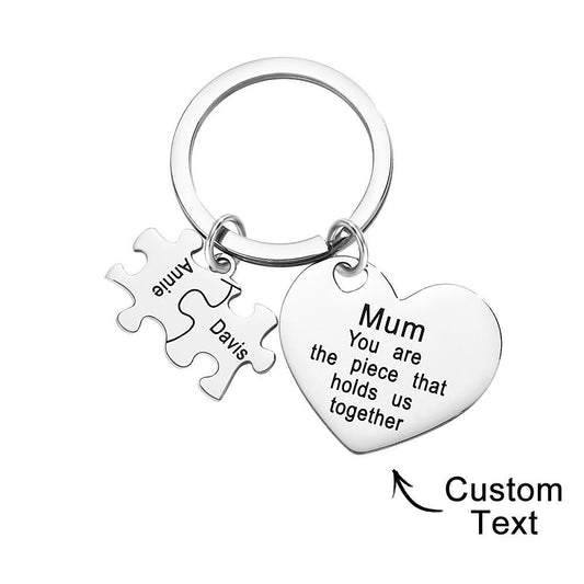 Personalised engraved puzzle heart keyring on white background — custom heart keychain perfect as a Mother's Day gift