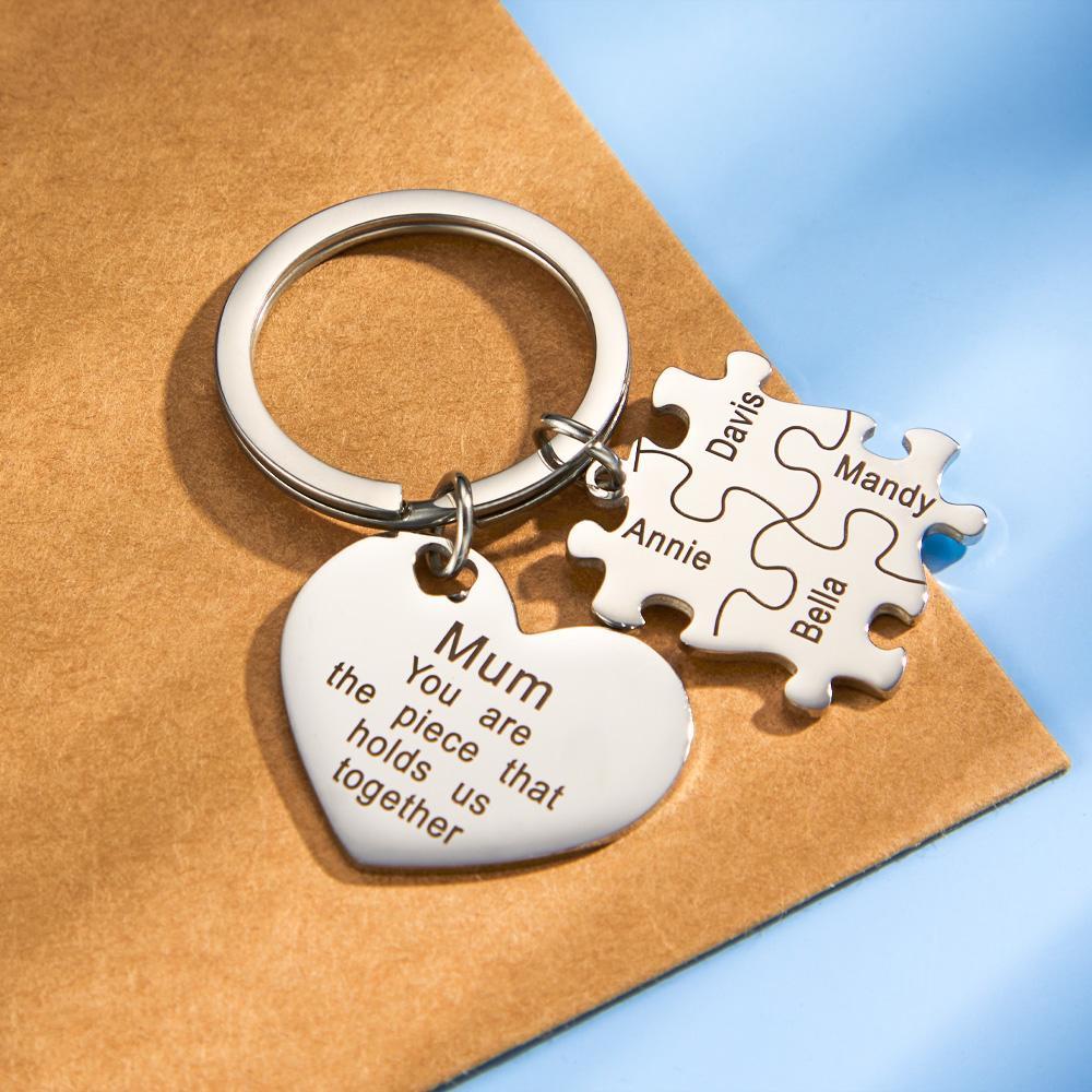 Personalised engraved heart keyring held in hand to show scale — custom heart keychain ideal for Mother's Day and anniversaries