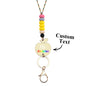 Personalised apple keychain attached to keys and lanyard — compact teacher key holder and ID pass accessory