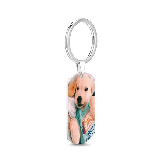 Personalised engraved stainless steel photo tag keychain — polished rectangular tag with a finely engraved photo and custom name hanging from a split key ring, studio close-up