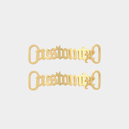 Gold personalised name metal shoelace charm threaded on trainer laces, custom shoe buckle detail
