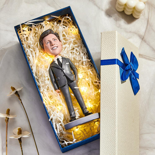 Personalised male teacher bobblehead in black suit, handmade polymer clay custom face figurine with engraved base — ideal teacher gift and mentor keepsake