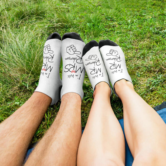 Personalised honeymoon photo socks showing matching bride and groom faces — custom printed polyester socks, ideal personalised gift for newlyweds