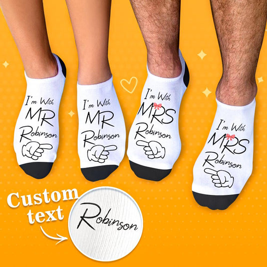 Personalised honeymoon photo socks showing matching bride and groom faces — custom printed polyester socks, ideal personalised gift for newlyweds