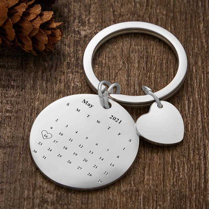 Personalised calendar photo keyring attached to keys and a bag showing a calendar style keepsake to carry memories daily