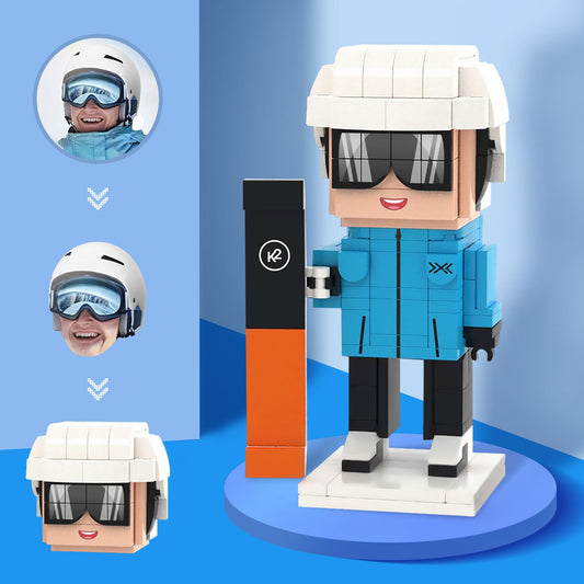 Front view of a personalised brick figure snowboarder head block toy, showcasing a custom face and hairstyle in a block figure design.