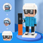 Front view of a personalised brick figure snowboarder head block toy, showcasing a custom face and hairstyle in a block figure design.