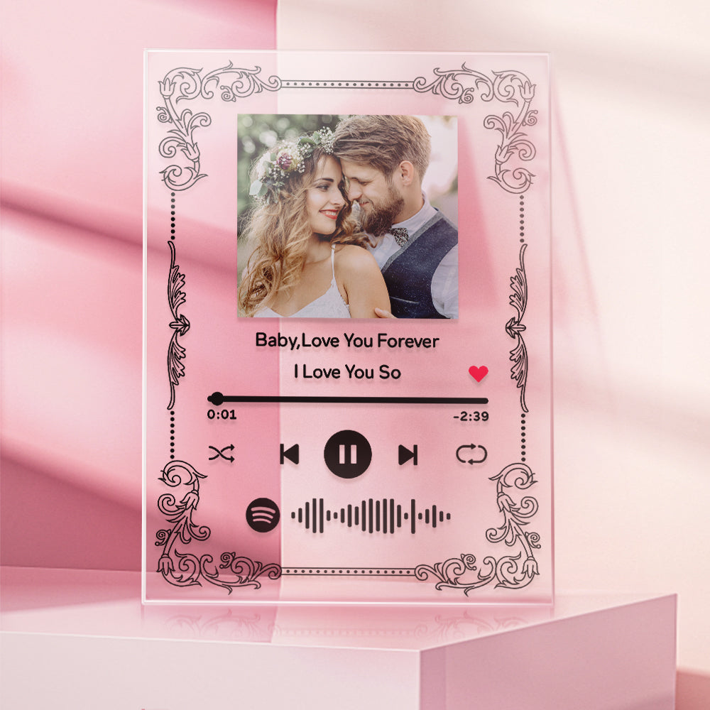 Detail shot of engraved scannable code and song text on clear acrylic plaque — stylish engraved gift for music-loving couples