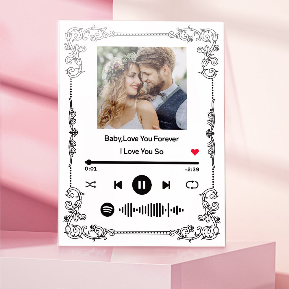 Acrylic music plaque and matching keychain displayed on a stand, showing engraved song title, artist name and personalised photo — anniversary and Valentine’s Day gift