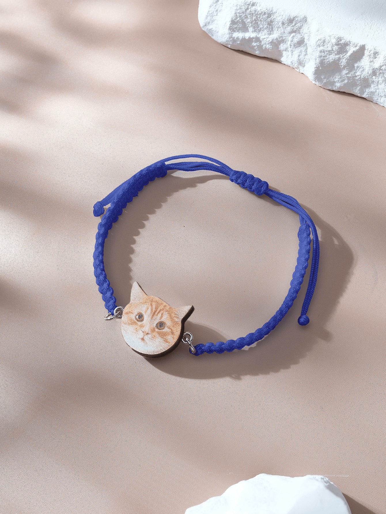 Pet portrait pendant on adjustable bracelet in natural wood tone