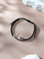 Close up of pet portrait on wooden pendant within bracelet