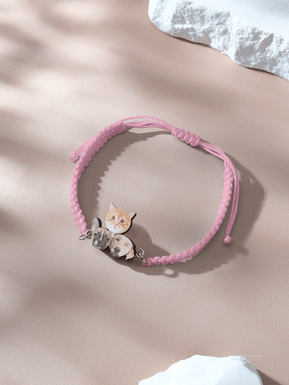 Close up of pendant and adjustable rope on bracelet