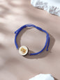 Wide view of bracelet with pet portrait pendant