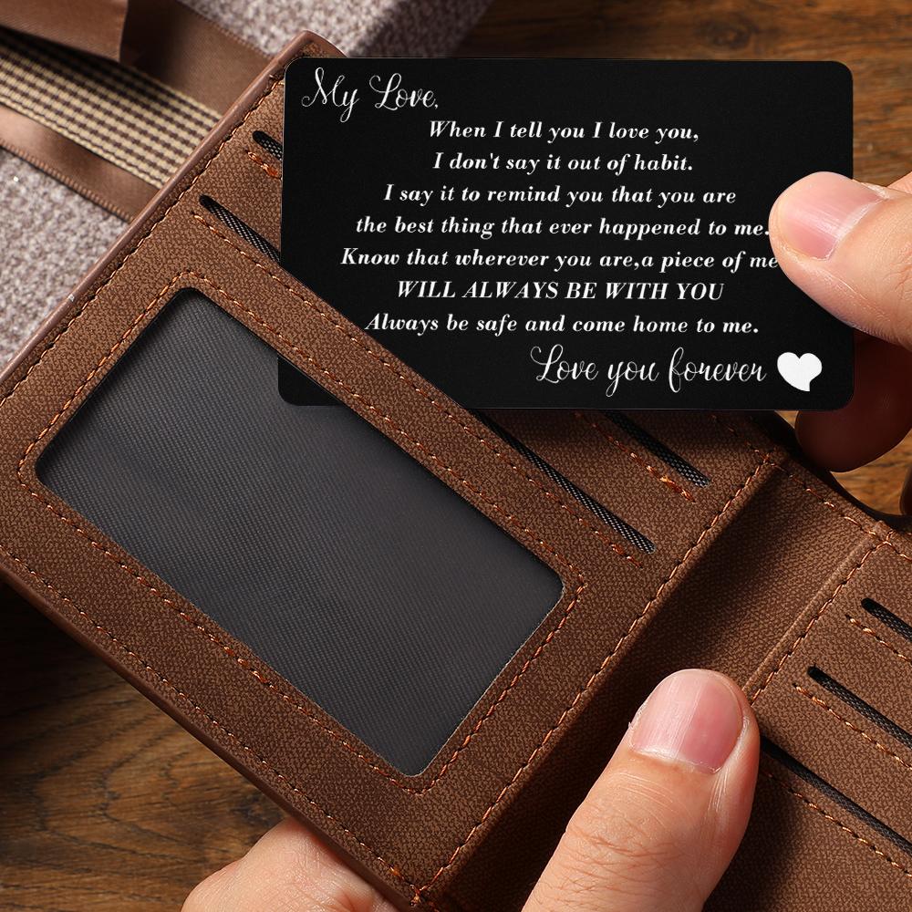 Close-up of personalised engraved metal wallet card showing an engraved photograph and customised message – ideal romantic keepsake