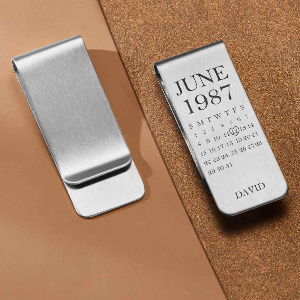 Handmade personalised stainless steel money clip presented as stylish groomsmen or husband gift with engraving