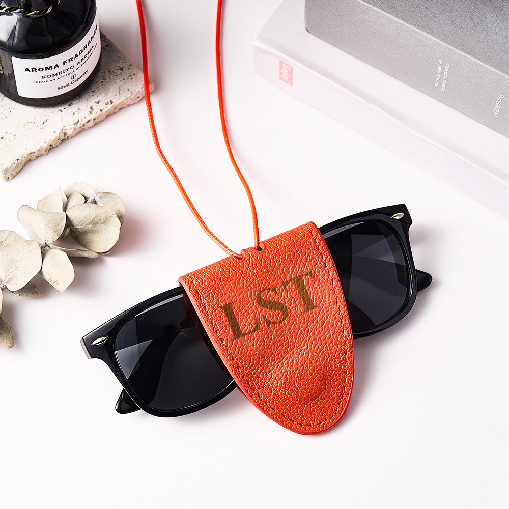 Personalised leather glasses clip lanyard clipped to blouse pocket – practical eyewear holder for work or commute