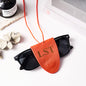 Personalised leather glasses clip lanyard clipped to blouse pocket – practical eyewear holder for work or commute