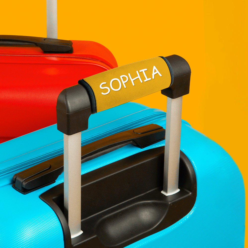 Luggage carousel scene featuring personalised neoprene handle wrap on suitcase for fast identification at baggage reclaim