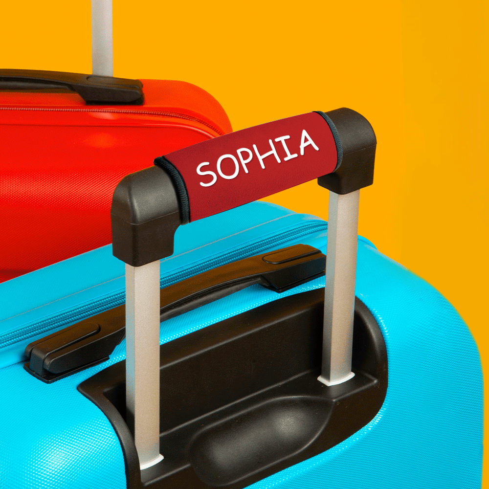 Variety of colourful personalised neoprene luggage handle wraps displayed, perfect personalised gifts for frequent flyers