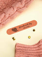 Close-up showing durable PVC material and crisp personalised text on a custom label