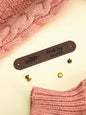 Labels displayed with knitting needles and yarn — perfect for knitwear makers and crafters