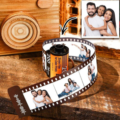 Personalised photo film roll keyring featuring a custom camera-style film with uploaded images, crafted from recycled materials and finished with a sturdy metal keyring.