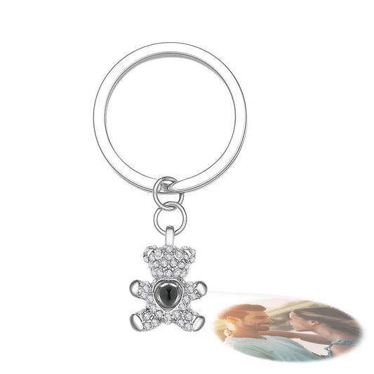 Bear-shaped personalised photo projection keychain on white background with chain and key ring — unique custom gift to cherish special memories