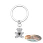 Bear-shaped personalised photo projection keychain on white background with chain and key ring — unique custom gift to cherish special memories