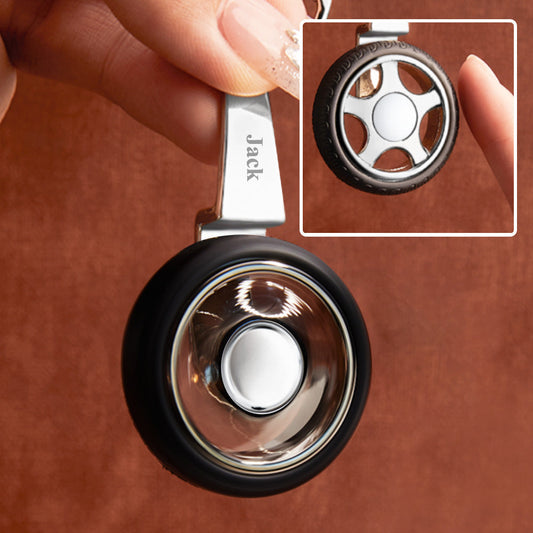 Custom Name Tire Keychain close-up showing spinning tyre with realistic tread and personalised engraved hub – perfect personalised spinning wheel gift for him