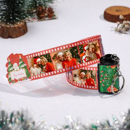 Angled view of a custom photo film keyring in durable lightweight plastic with crisp long‑lasting images and option for personalised text or music perfect for anniversaries and wedding gifts