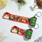 Close up of a Personalised Photo Film Keychain showing a retro miniature film strip with three custom high‑resolution photos and a silver split ring ideal as a Merry Christmas gift for couples and personalised photo keepsake