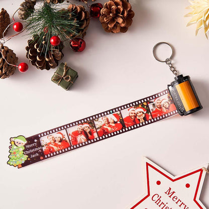 Camera film roll photo keyring hanging from a handbag — personalised photo keychain and compact keepsake gift