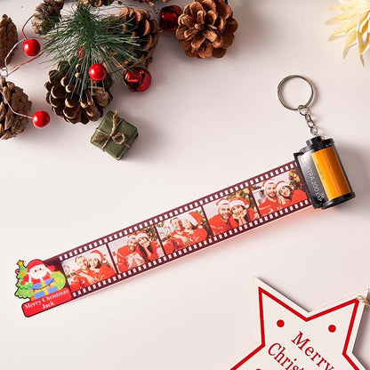 Personalised film strip keyring displayed with keys to show scale — custom photo camera film roll keychain