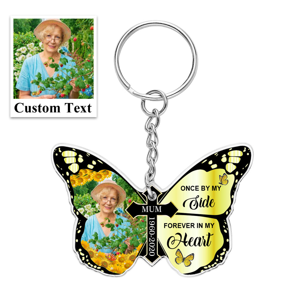 Close-up of personalised message area reading 'Once By My Side, Forever In My Heart' on acrylic butterfly and cross keyring – engraved-style keepsake