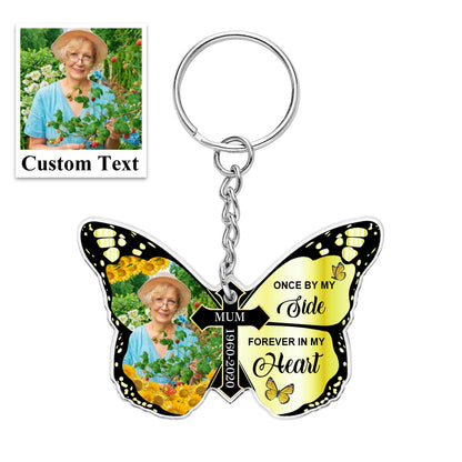 Close-up of personalised message area reading 'Once By My Side, Forever In My Heart' on acrylic butterfly and cross keyring – engraved-style keepsake