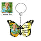 Close-up of personalised message area reading 'Once By My Side, Forever In My Heart' on acrylic butterfly and cross keyring – engraved-style keepsake