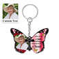 Acrylic butterfly and cross keychain held in hand for scale – 2.36in × 1.6in (6cm × 4cm) personalised remembrance keyring