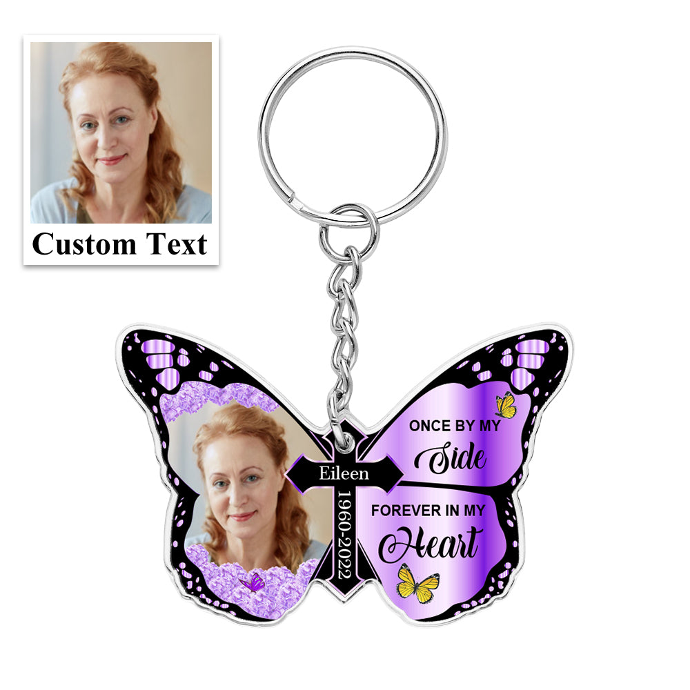 Personalised Butterfly & Cross Keychain on white background showing 'Once By My Side, Forever In My Heart' engraved-style text – acrylic memorial keyring 6cm × 4cm