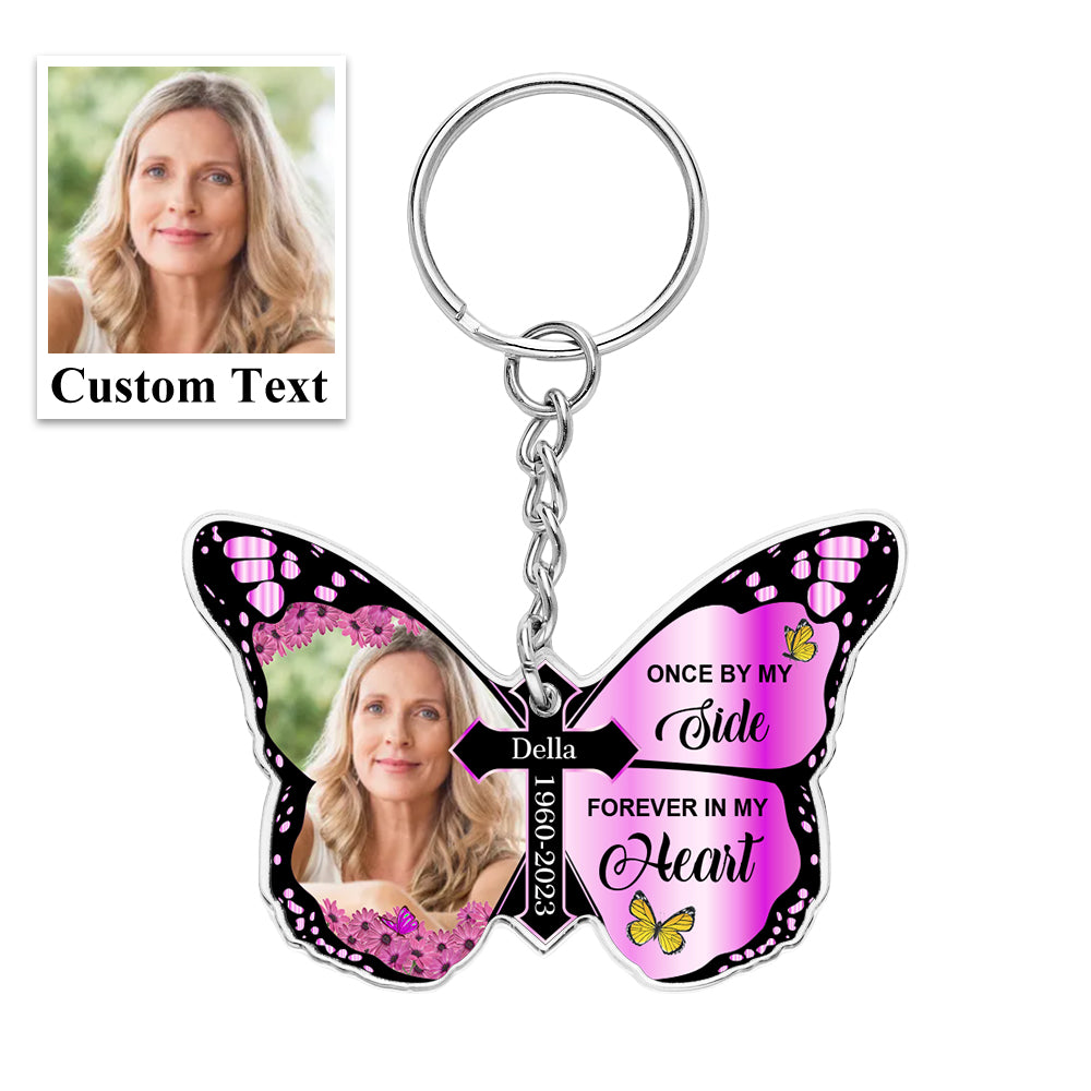 Lifestyle shot of personalised butterfly and cross keyring on everyday keys and bag – meaningful keepsake for family or friends