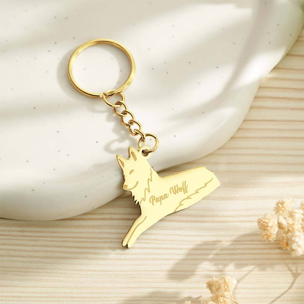 Size comparison of small and large personalised wolf family keyrings side by side — helpful guide to choose your engraved family keyring