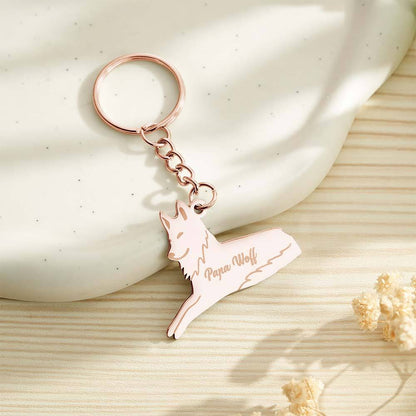 Monochrome edit emphasising engraved names on the wolf pendant — elegant personalised wolf keyring and engraved family keepsake
