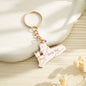 Packaged personalised wolf family keyring with a care card ready to gift — engraved family gift idea for Mother's Day or birthdays