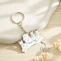 Wolf family keyring hanging from a handbag ring, personalised with names — thoughtful engraved keyring for family, gifts for her or him