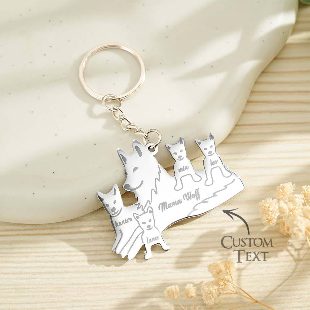 Row of personalised wolf family keyrings displaying different size options — choose the perfect engraved wolf family keyring for your family