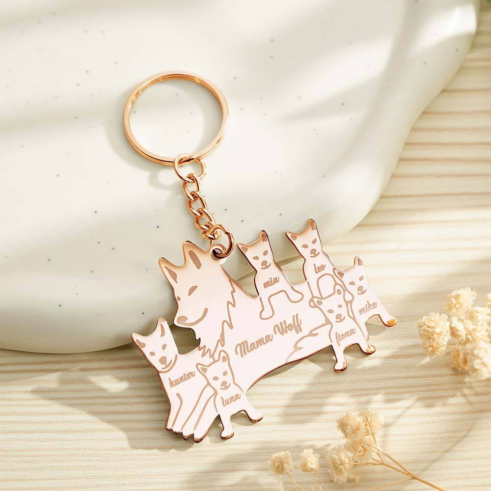 Side profile showing pendant thickness and brushed stainless finish — robust engraved wolf family keyring built to last