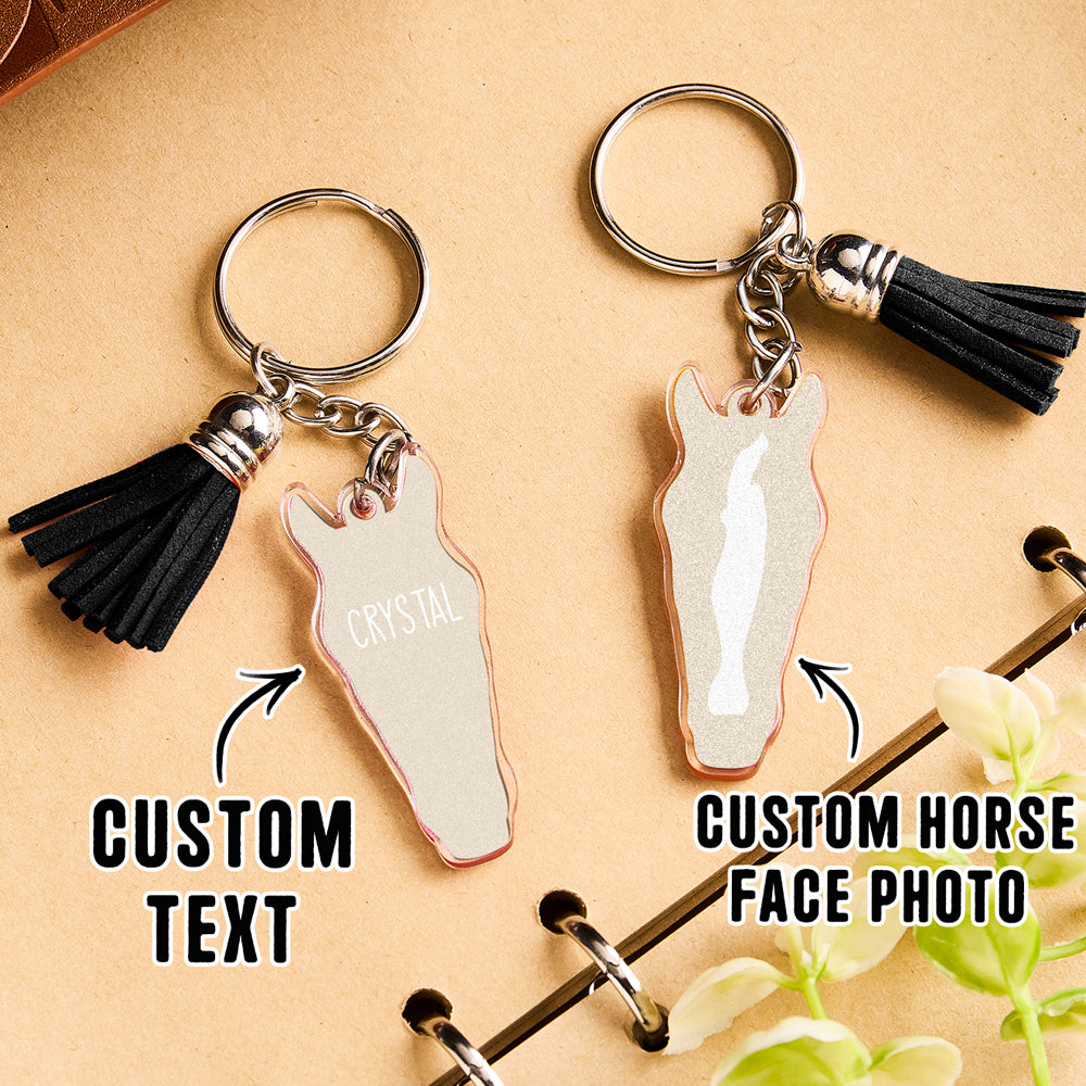 Personalised horse face acrylic keyring with tassel clipped to a backpack strap as an equestrian bag charm