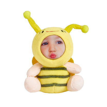 Side view of a personalised 3D face plush keychain showing the metal clasp and plush backing – compact personalised keyring for backpacks