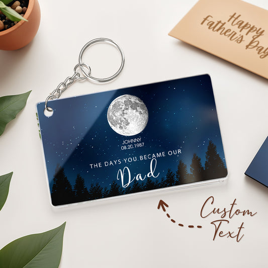 Personalised Starry Night 'The Day You Became Dad' acrylic keyring showing the custom moon phase and engraved text on a starry background, custom moon phase acrylic keychain