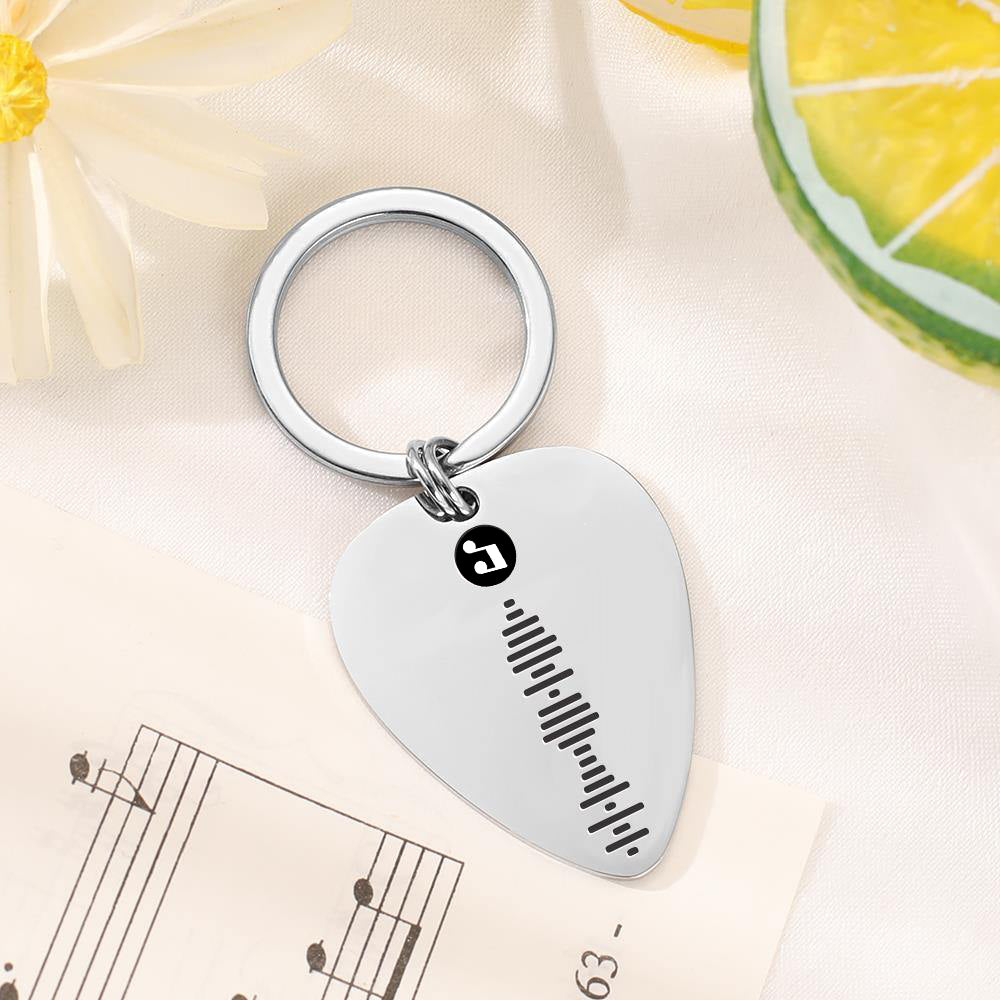 Personalised music keepsake keyring – guitar-pick-shaped acrylic plaque engraved with song and artist, custom photo and scan-to-play code for uploaded MP3
