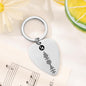 Personalised music keepsake keyring – guitar-pick-shaped acrylic plaque engraved with song and artist, custom photo and scan-to-play code for uploaded MP3